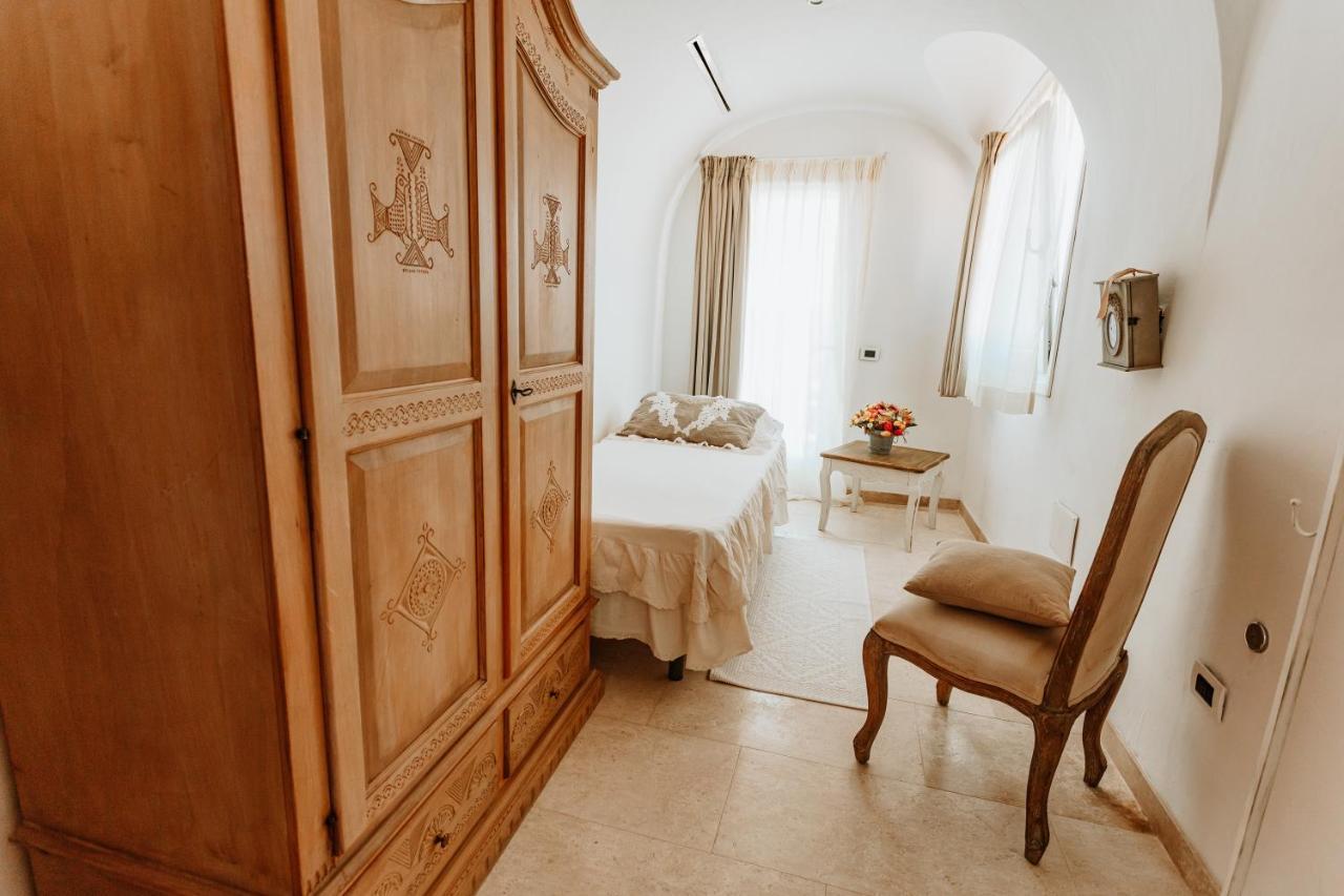 Hotel Pulicinu Baja Sardinia Exterior photo