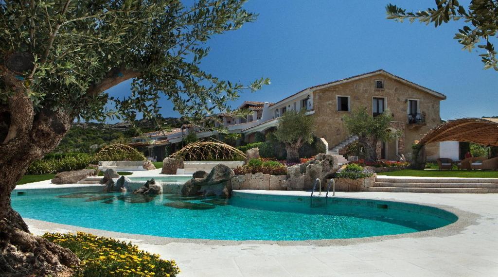 Hotel Pulicinu Baja Sardinia Exterior photo