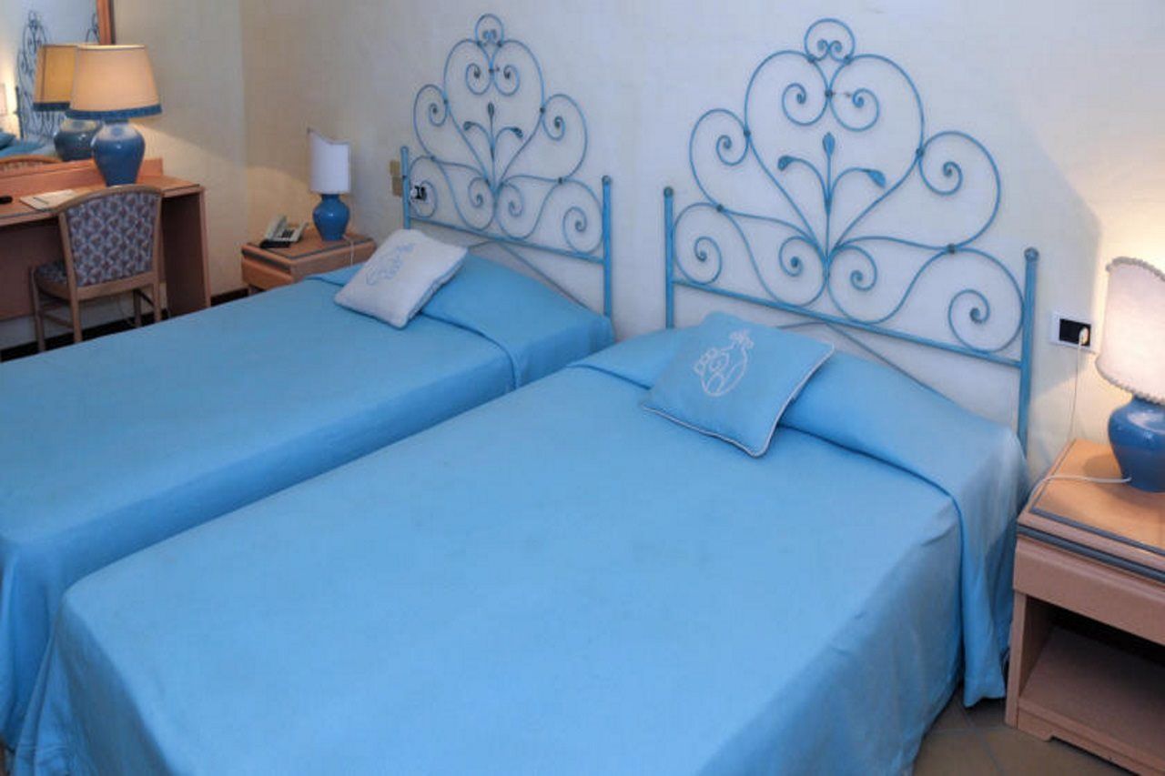 Hotel Pulicinu Baja Sardinia Exterior photo