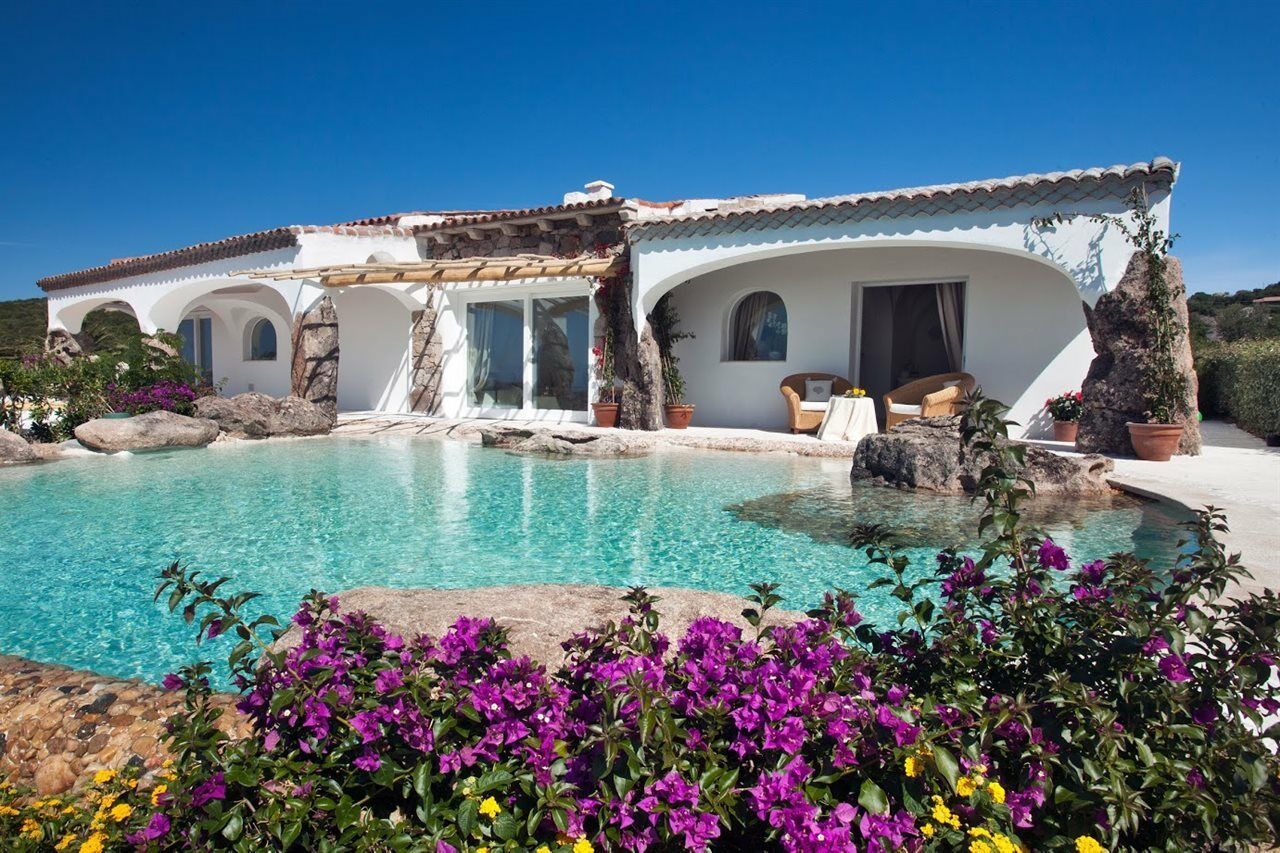 Hotel Pulicinu Baja Sardinia Exterior photo