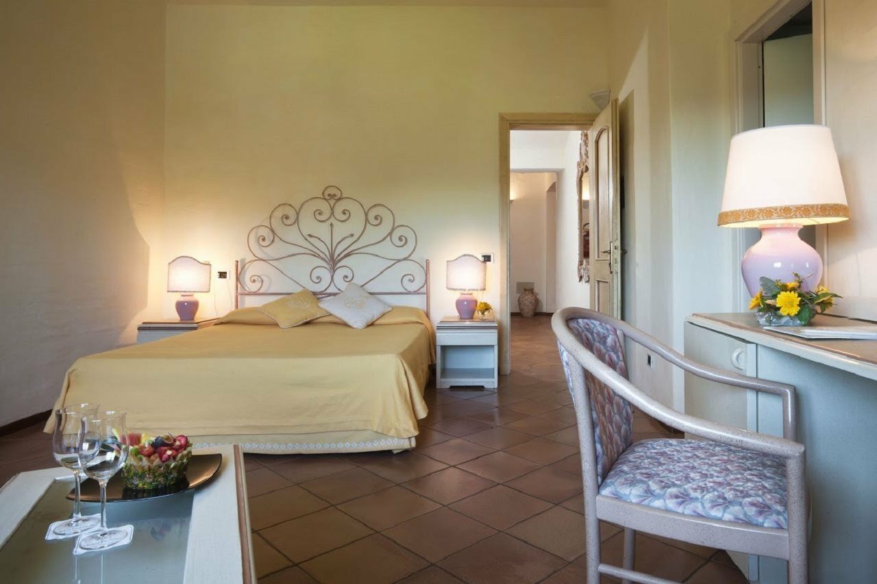 Hotel Pulicinu Baja Sardinia Exterior photo