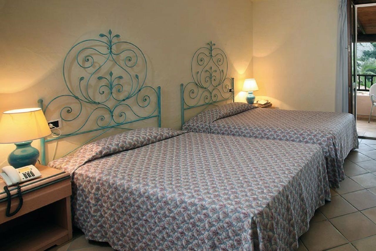 Hotel Pulicinu Baja Sardinia Exterior photo